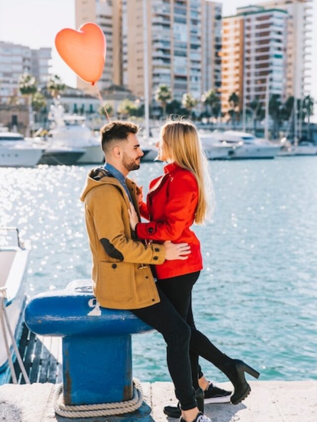 amorous-couple-with-heart-balloon-cityscape_23-2147738166