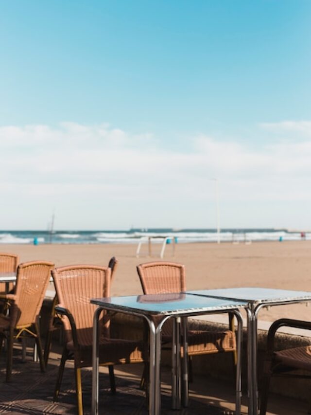 beach-concept-with-tables-chairs_23-2147796189