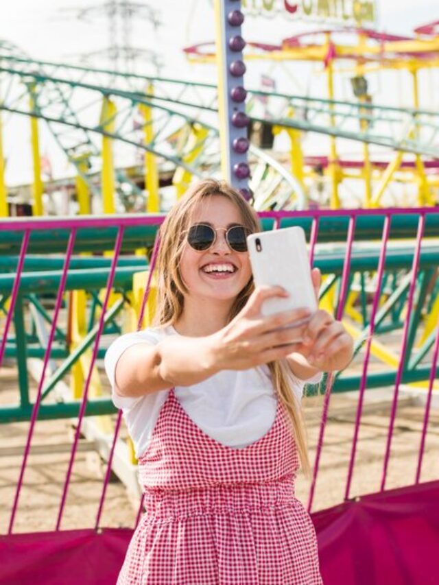 beautiful-young-woman-amusement-park_23-2147918075