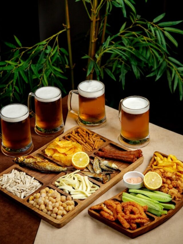 beer-setup-with-beer-glasses-snack-platters_140725-6495