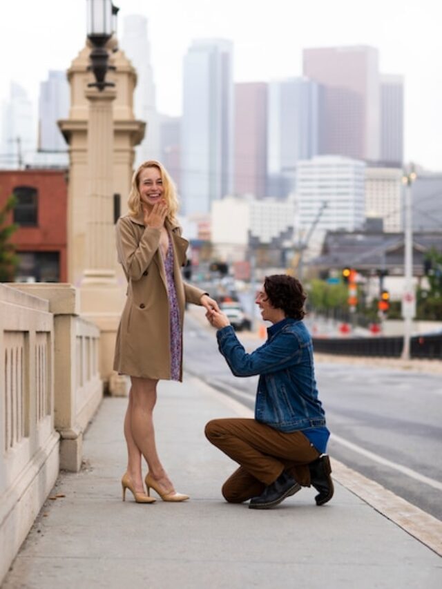 man-proposing-woman-outdoors-street_23-2149488158