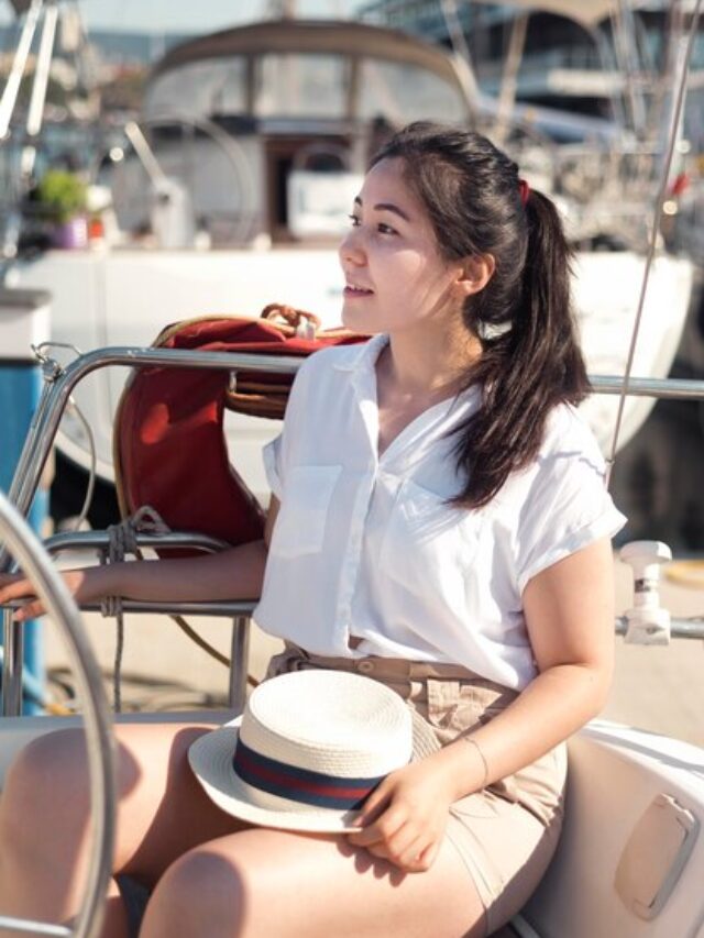 medium-shot-woman-sitting-boat_23-2148700813