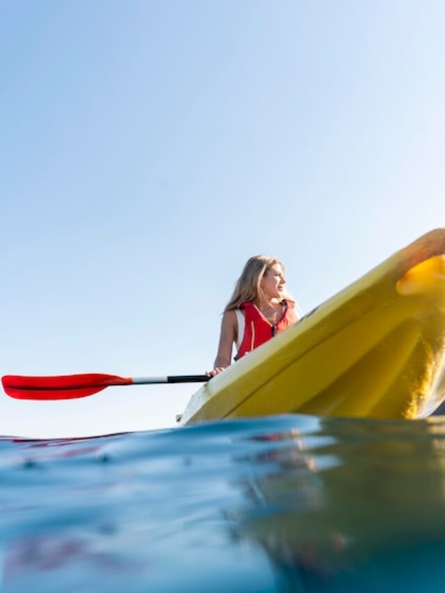 young-beautiful-woman-traveling-by-canoe_23-2149062989